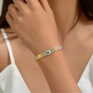 # 36 Gold Tone Evil Eye Bracelet